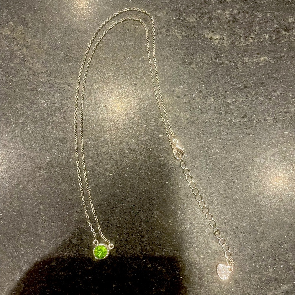 Esbe marked necklace Peridot. Silver with a green solitaire August birth stone